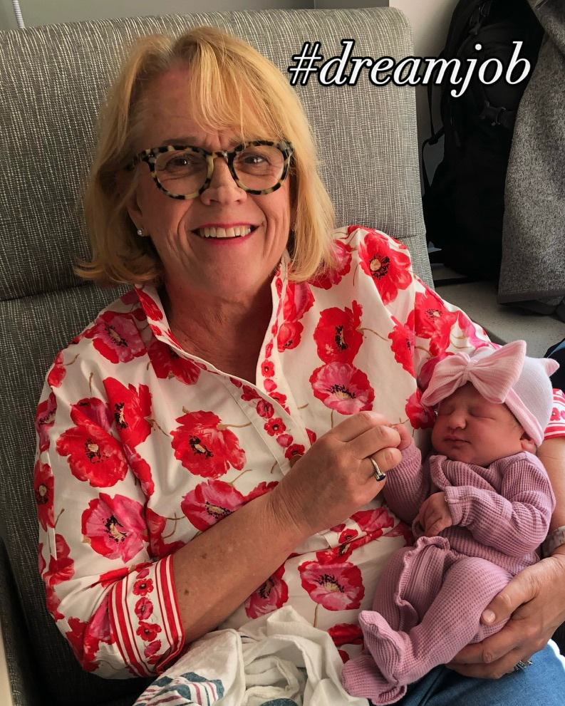 Kathleen Lindell, PhD, RN, ATSF, FAAN, is Associate Professor | Mary Swain Endowed Chair in Palliative Care Health at MUSC College of Nursing; in this photo she is holding her newborn granddaughter.